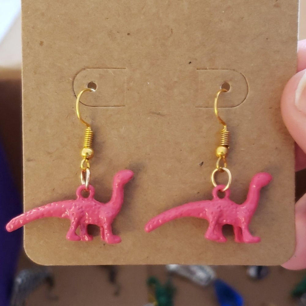 Pink dinosaur earrings